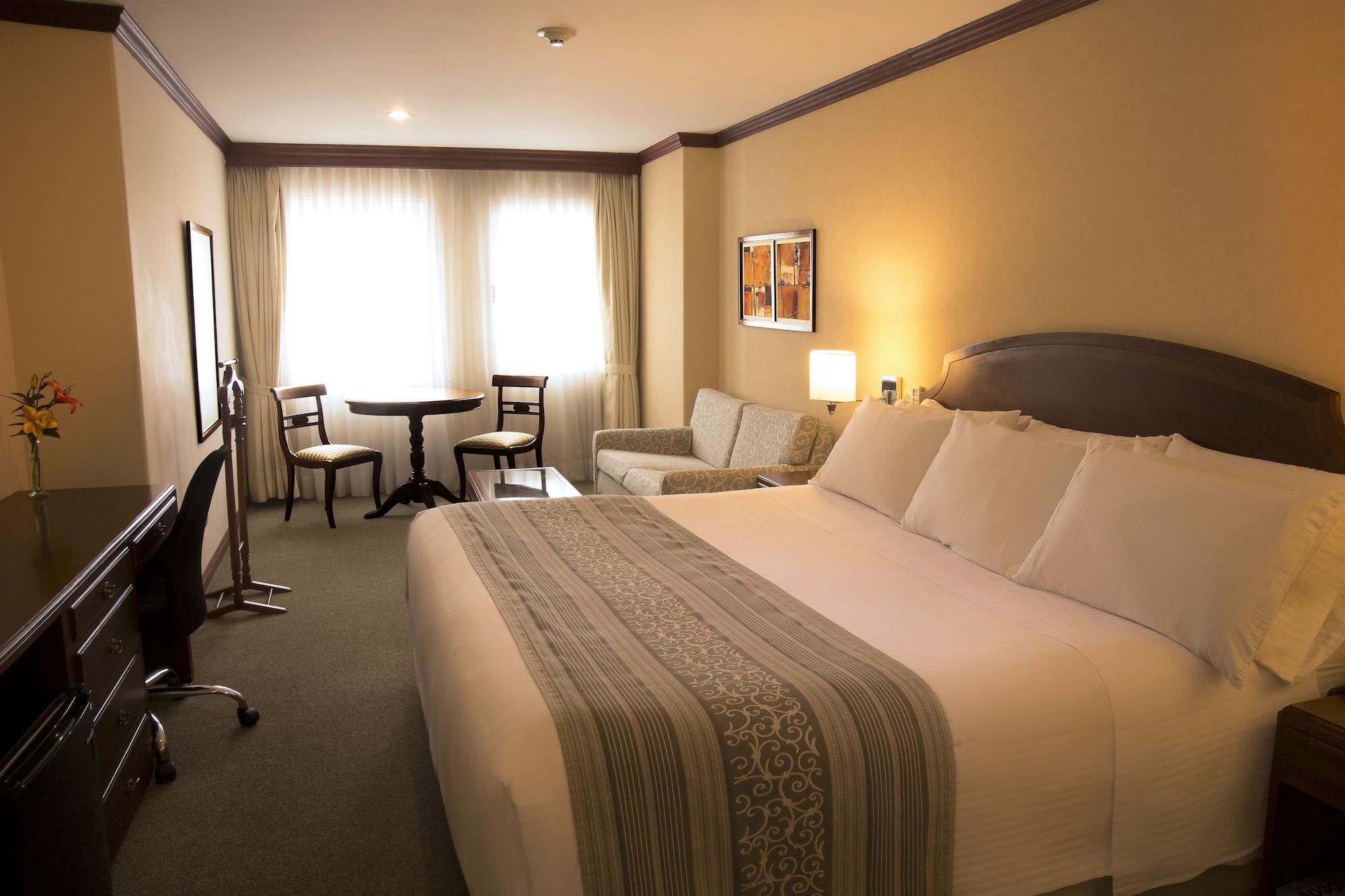 Hotel Dann Carlton Bogota Bagian luar foto A room at the hotel